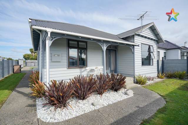 CHARMING FOUR-BEDROOM, TWO BATHROOM HOME