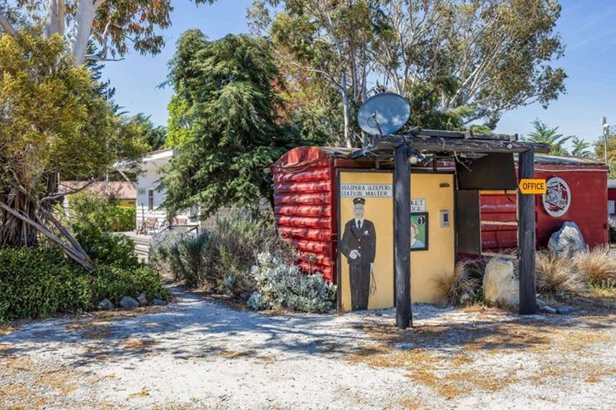 'It's a steal' - quirky home with trains in the backyard sells for bargain price