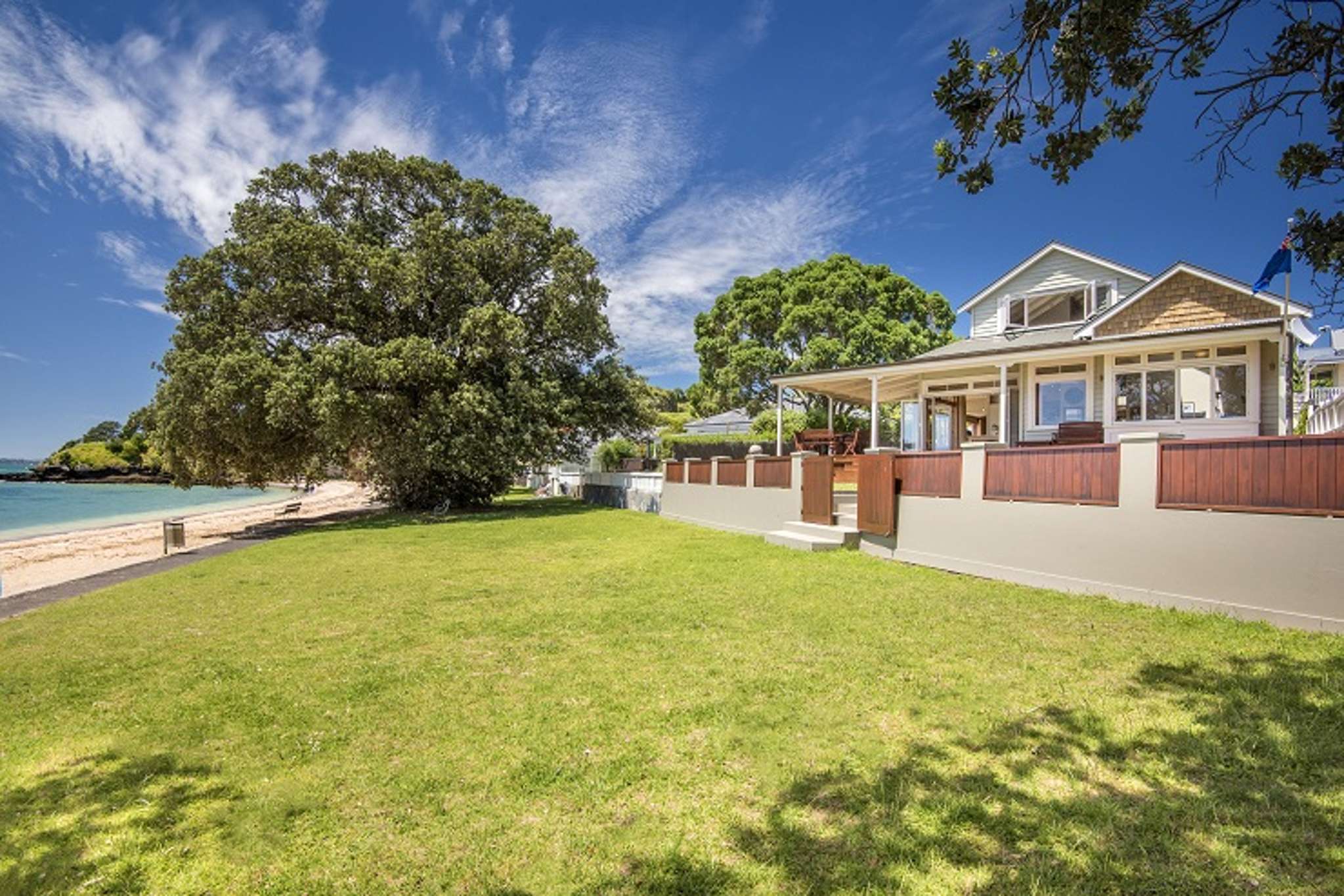 Two Auckland waterfront homes sell for total of $14m-plus