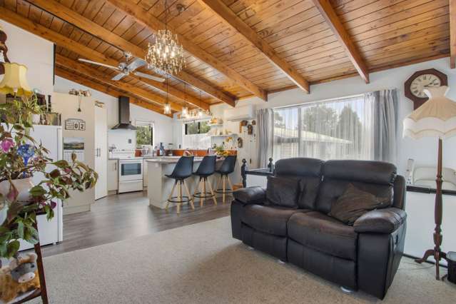 Solid Brick, Sunny Outlook & a Short Walk to Town!