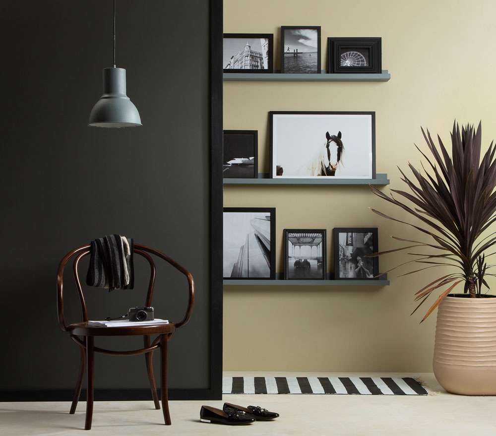 Painting your home a dark colour is a bold move but the result is worth it.