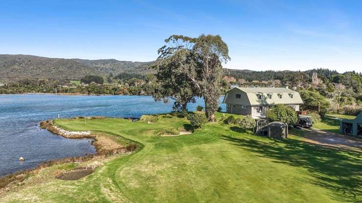 Spread across 2.7ha of bush and open lawns, the four-bedroom retreat at 92G Edmonds Road, in Kerikeri, is looking for a buyer with $2m-plus to spend. Photo / Supplied
