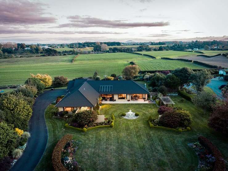 A six-bedroom, three-bathroom home on Devine Road in Tamahere sold for $2.905m, nabbing the owners an extra $5000 despite buying it at the peak of the market. Photo / Supplied