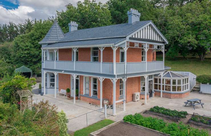 A five-bedroom lodge-style home for sale at 109 Town Point Road, in Maketu, Western Bay of Plenty. Photo / Supplied