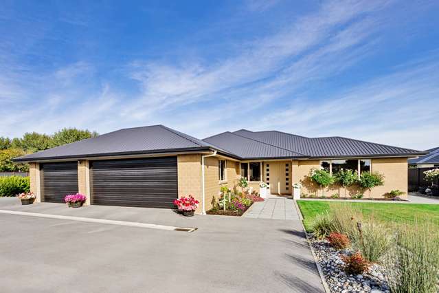 Four bedrooms plus three car garaging