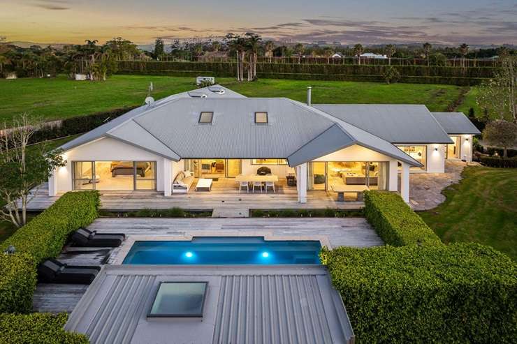 Property values in Point Wells, on Auckland’s northern fringe, have jumped by almost $200,000 in the last 12 months and nearly <imgm since 2020. Photo / Fiona Goodall