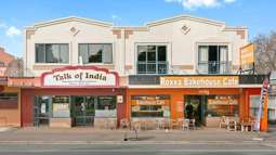 Retail block with Indian restaurant for sale