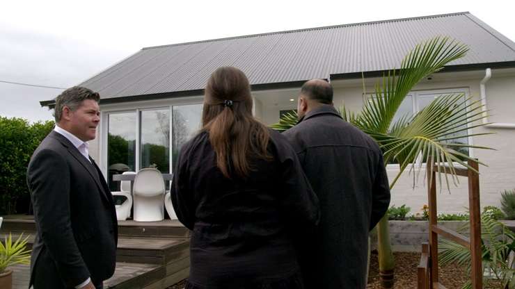 Jayne Kiely shows Joel’ and Daniel the joys of new-builds in Auckland's Mt Albert. Photo / Supplied