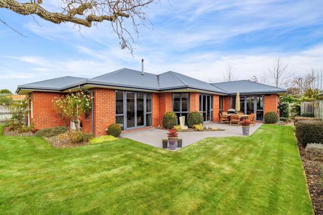 Triple Car Garaging - This home must be sold!