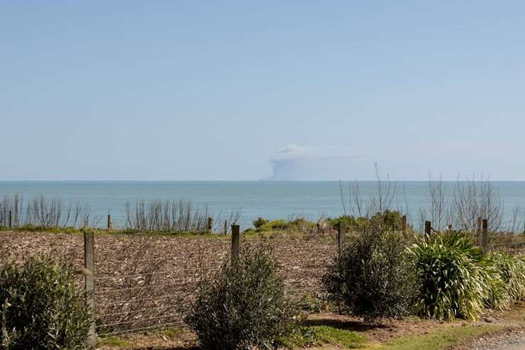 A section in Waihau Bay, Ōpōtiki, still needs to be cleared after being destroyed in a large fire. Photo / Supplied