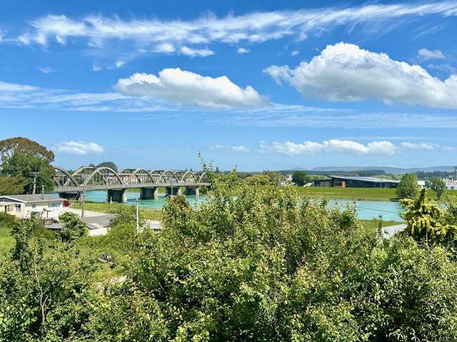 Elevated 4-Bedroom Family Home with River Views