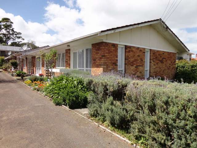 Single  level brick and tile sunny unit