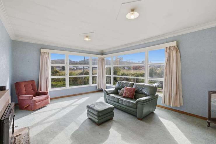 A comfy two-bedroom home at 41 Rangatira Drive, in Mangakino, Taupō, is looking for offers over $290,000. Photo / Supplied