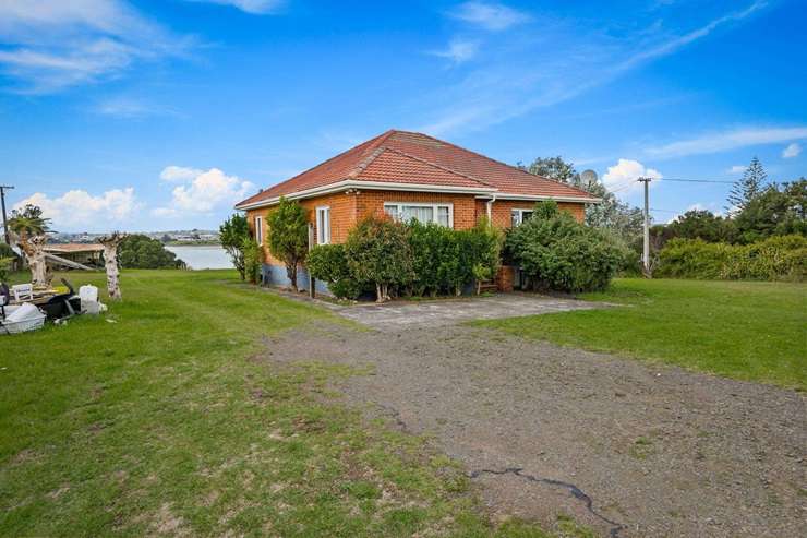 The vendors had planned to build their dream on the 6,475sqm section at 123 Kauri Road, in Auckland's Whenuapai. Photo / Supplied