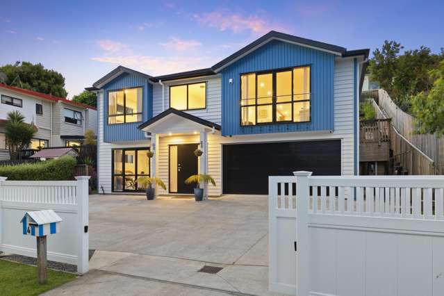 A spacious home with a sunset deck and gardens