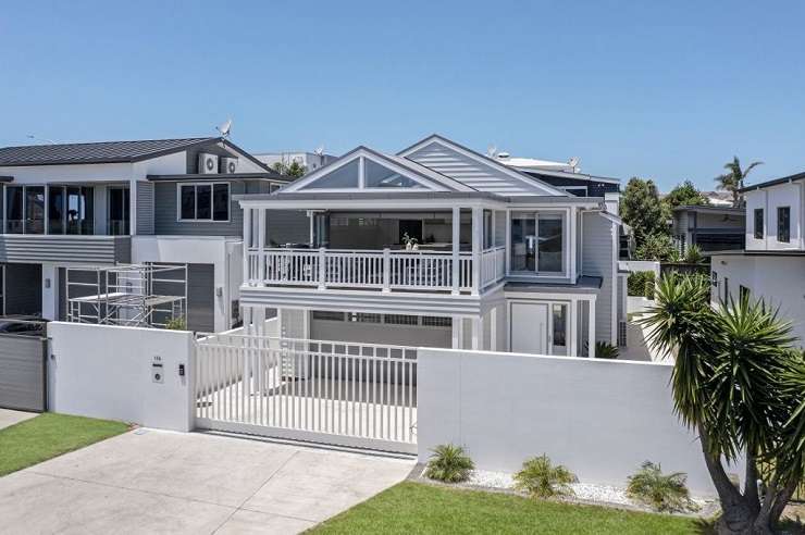 deck chairs overlooking roof tops to the sea at 306B Beverly Terrace, Whangamata, Coromandel Peninsula, Waikato