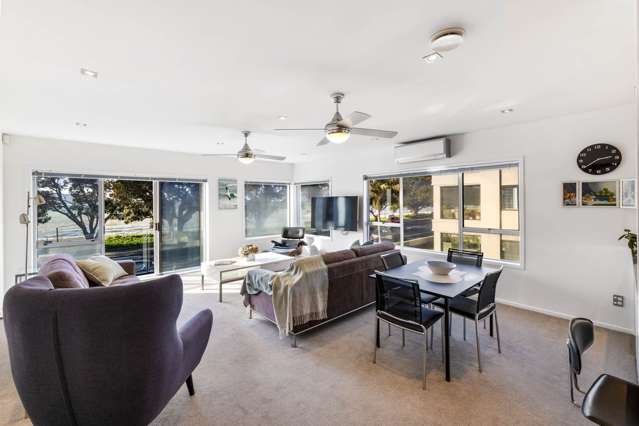 First-Storey Beachfront Sanctuary with Harbour...
