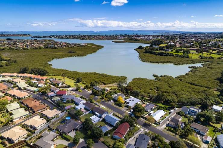A seven-bedroom, seven-bathroom home at 55 St Annes Crescent, in Wattle Downs, Auckland, is up for grabs. Photo / Supplied