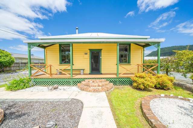 Kowhai Cottage - A Charming 1880s Kauri Bungalow