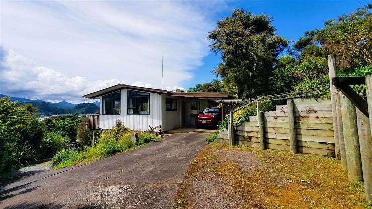 The Pink Bach in Te Kouma is for sale for the first time in 62 years. Photo / Supplied