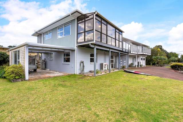 Steps From the Water with dual Income Potential