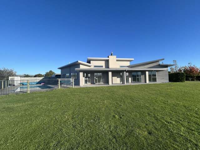 Exceptional Lifestyle Living with Breathtaking Views from Every Angle