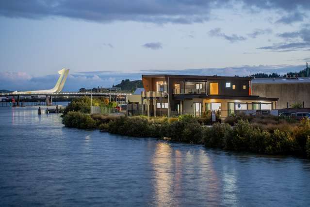 A waterfront icon - Home and income opportunity...