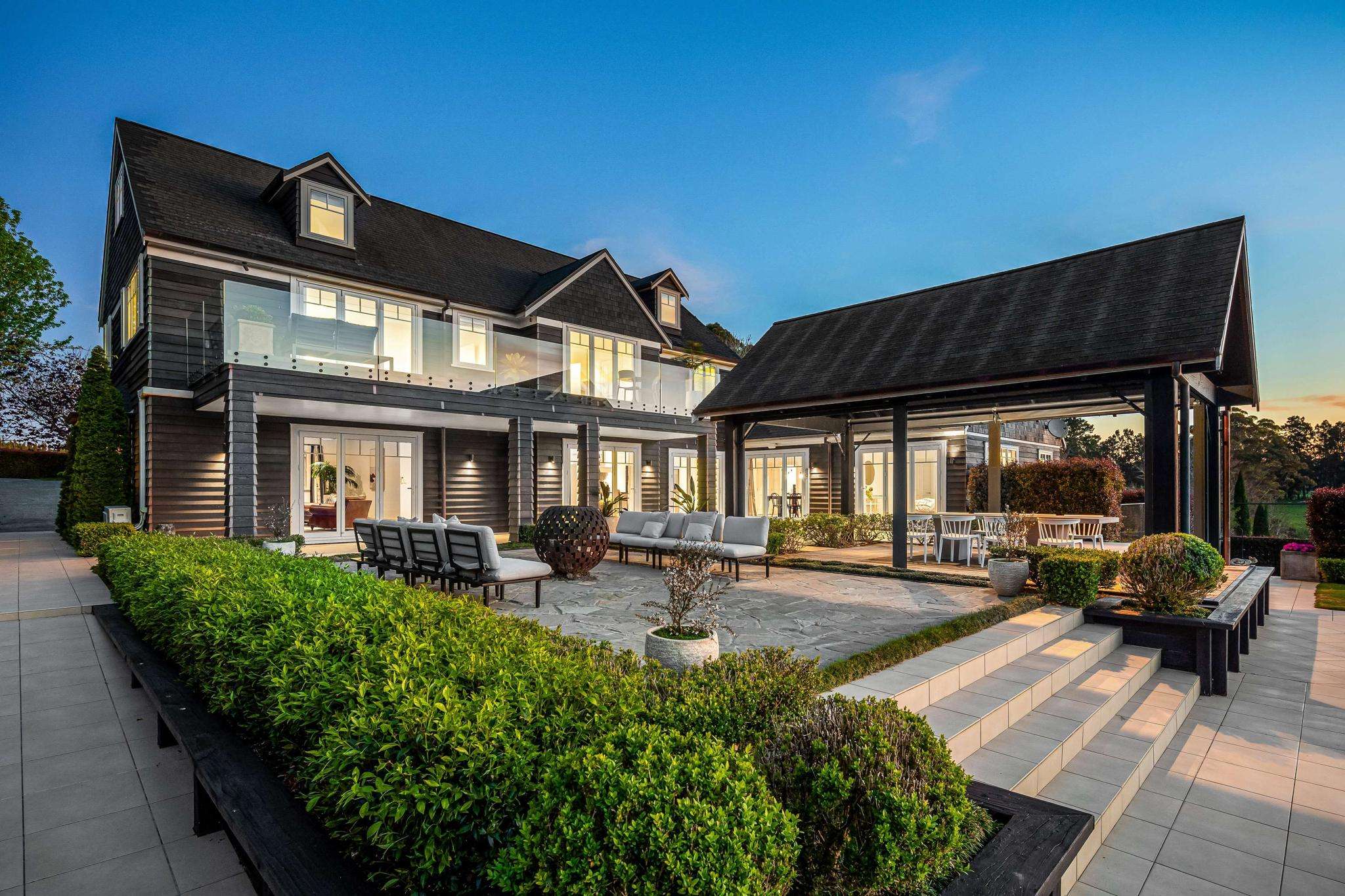 Dubai couple fly in for whirlwind tour of 30 Auckland houses, buy one for over $5m