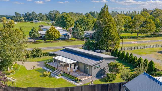 Modern home, beautiful gardens, village living