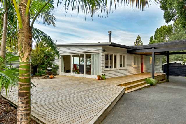 Spectacular bush and distant harbour views - Modernised and Private.
