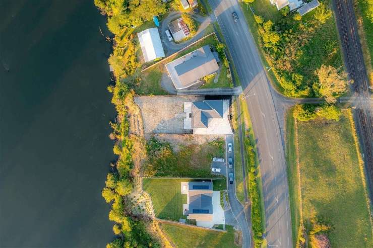 RE/MAX Flagship Hamilton owner Harry Luther sold the brand-new riverside home on Great South Road, in Taupiri, for <img.049m. Photo / Supplied