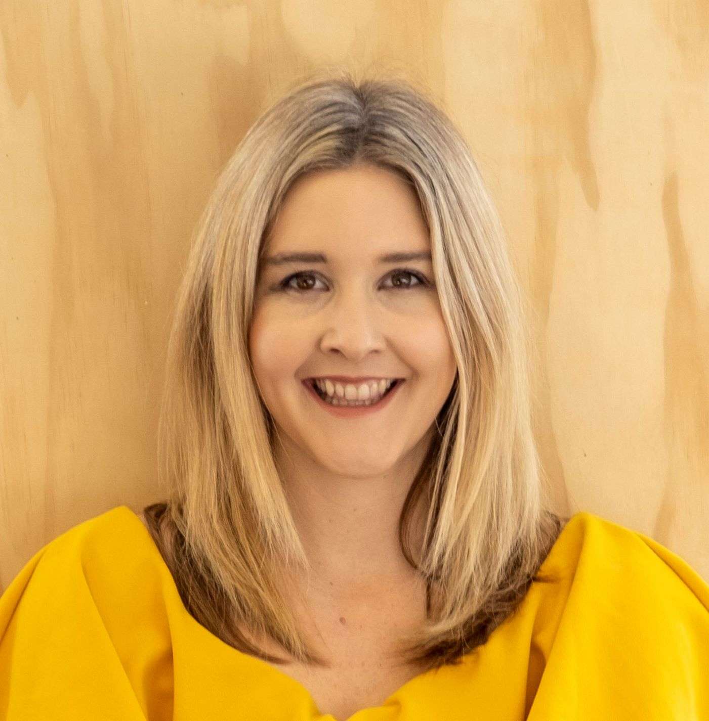 Hanging chair, pot plants in a room.