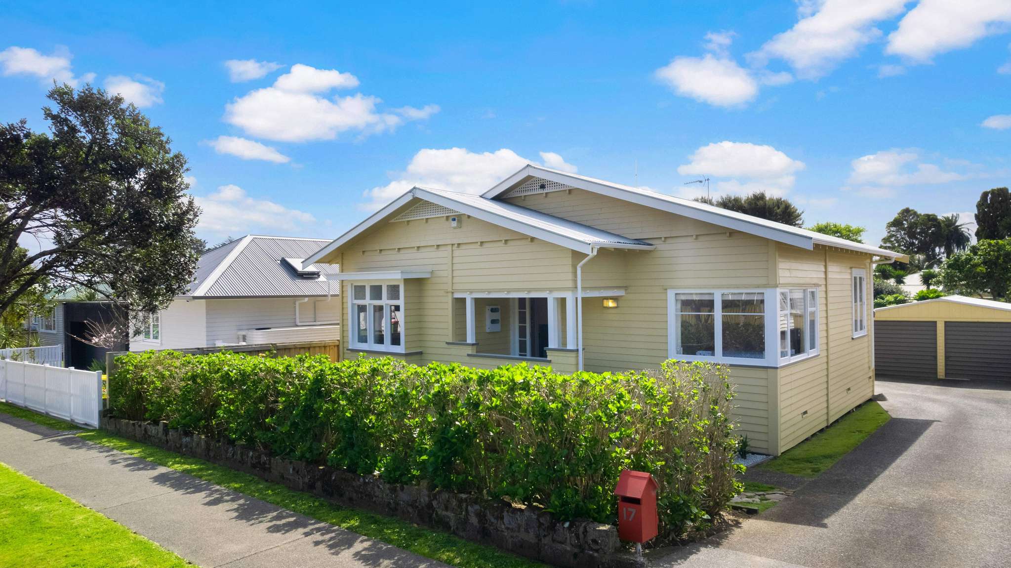 Eight bidders, three pre-auction offers: Mt Albert bungalow sells for $2.103m