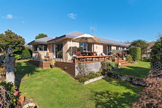 Charming Home with Stunning Views and Lush Gardens