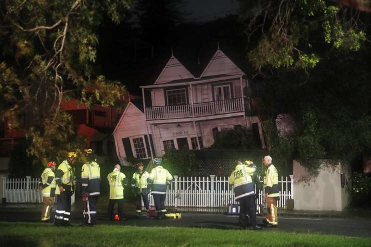 Flood-damaged furniture lies in the front yard of a house in the Motueka Valley. Photo / Tim Cuff