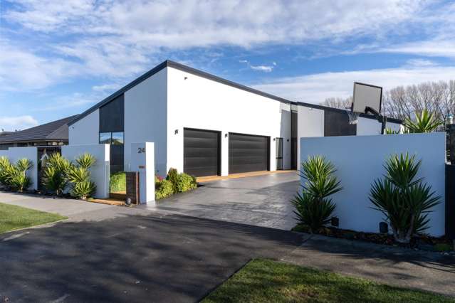 ARCHITECTURAL MASTERPIECE WITH TRIPLE GARAGING!