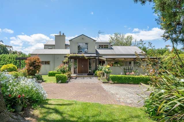 Beautiful home, stunning setting, large sheds