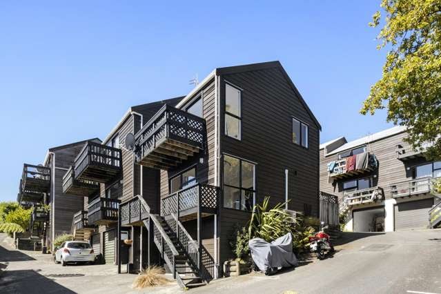 SUPER SUNNY, CORNER TOWNHOUSE WITH GARAGE.