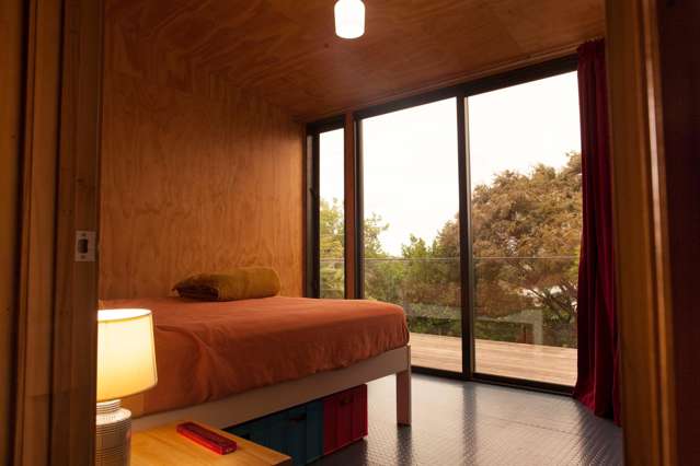 A Glass Sanctuary in the Trees – Rocky Bay Retreat