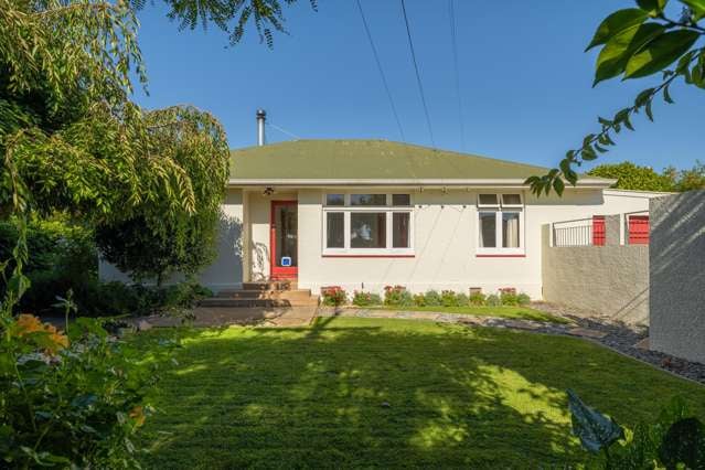 Pristine three-bedroom home with beautiful gardens