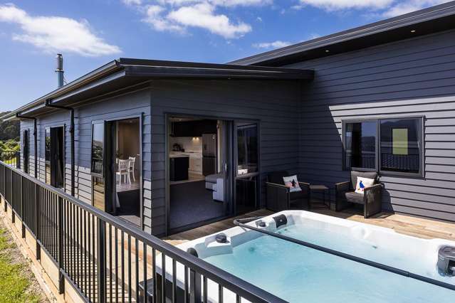 Near-New Coastal Living with Views to Inspire