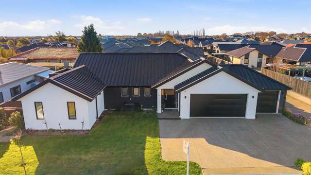 Space, Sun & Storage, Including a 3-Car Garage!