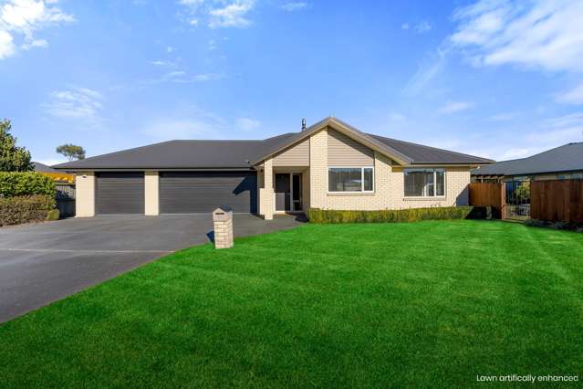 Much admired family home with four car garaging