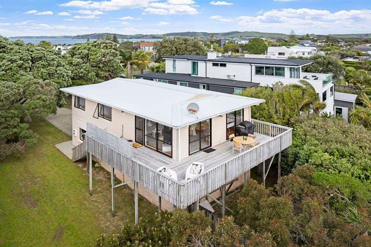 A two-bedroom leasehold bach at 9 Rockell Road, in Whananaki, Whangārei, has a $220,000 price tag. Photo / Supplied