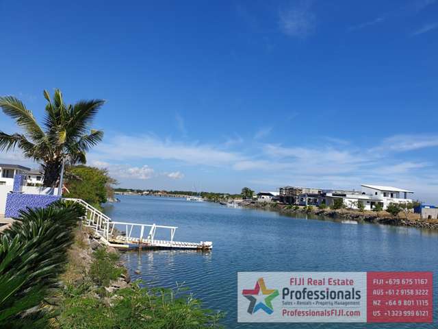 FOR SALE: Only 3 Remaining Waterfront Blocks of Residential Land with direct water access on Fantasy Island!