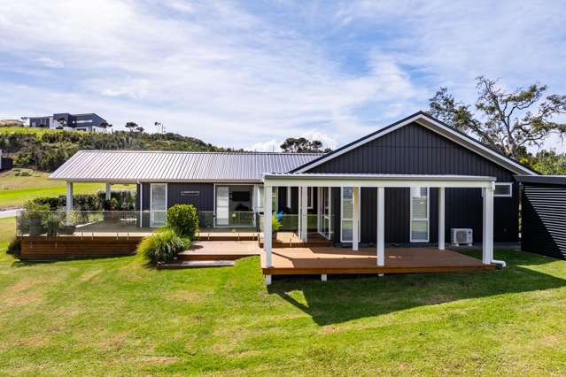 Sleek interior and picturesque estuary views