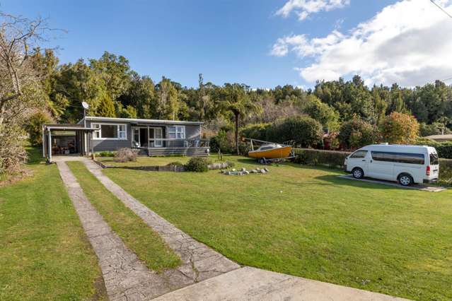 Quintessential Kiwi Bach and Man Caves Dream