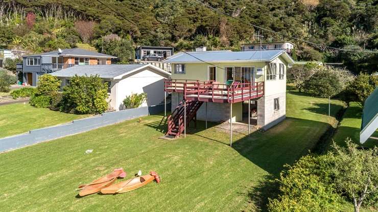 The Pink Bach in Te Kouma is for sale for the first time in 62 years. Photo / Supplied