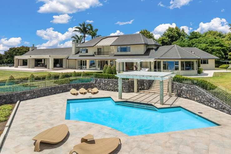 High-end estates dot Waiheke's Nick Johnstone Drive, where the median property value is just under <img0m. Photo / Fiona Goodall