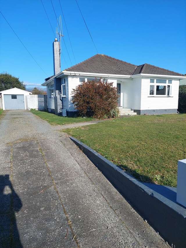 SUN-FILLED HOME IN QUIET STREET